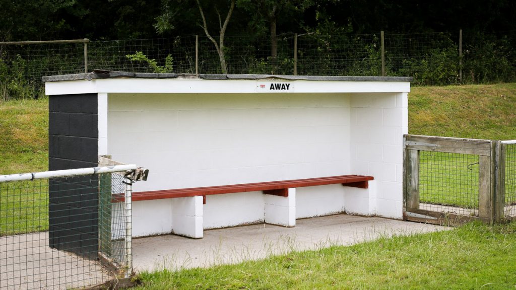 The away dugout at Binfield FC. Photo: Neil Graham / ngsportsphotography.com