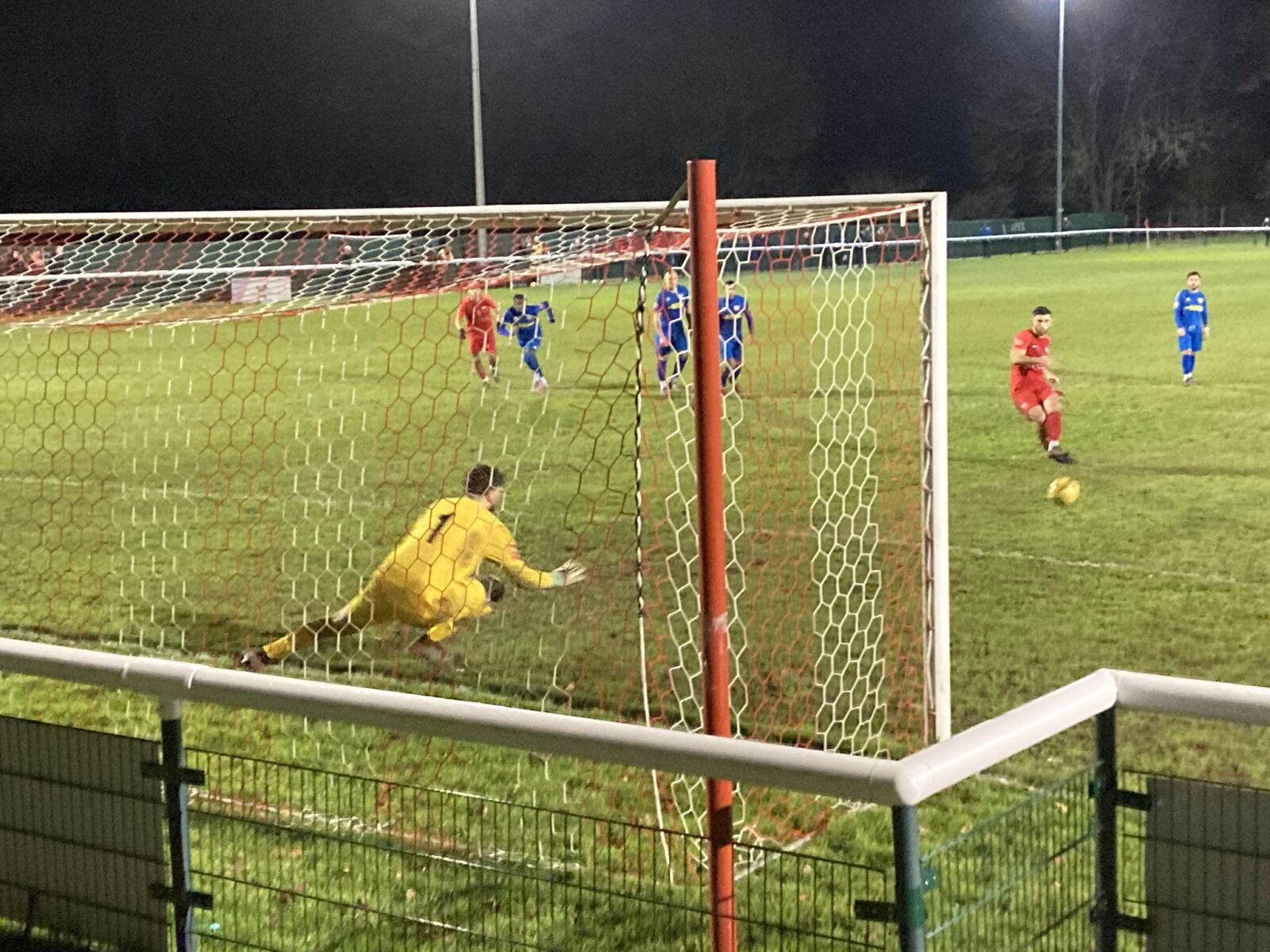 Brad Pagliaroli scores a penality against Ashford Town.